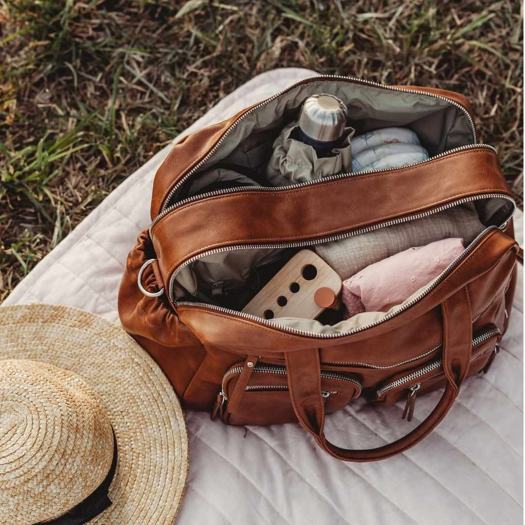inside of the oio nappy bag in tan faux leather 